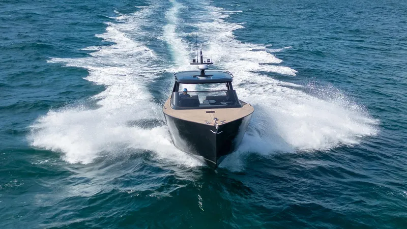  Yacht Photos Pics 2024 Colnago C38 OPEN yacht cruising on open water, creating a dynamic wake.