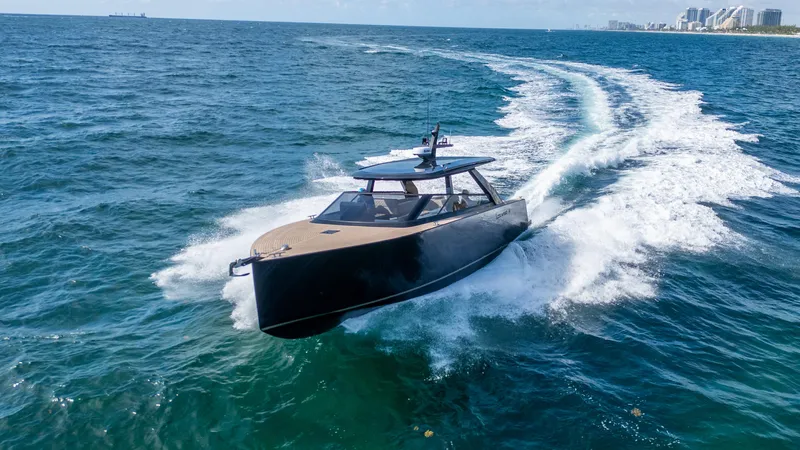  Yacht Photos Pics 2024 Colnago C38 OPEN yacht cruising on open water, leaving a wake behind.