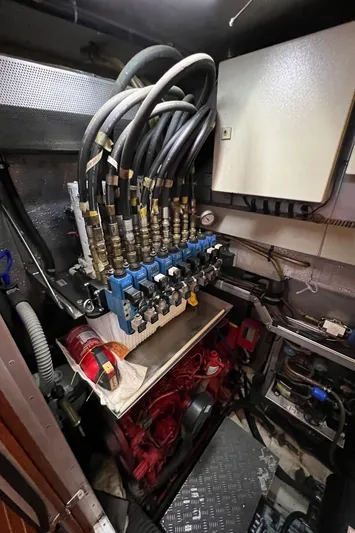  Yacht Photos Pics Engine room of 1999 Nautor Swan 68 yacht with hydraulic system and control panel.