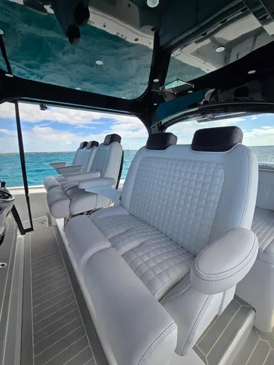 Lady Mash Yacht Photos Pics Luxurious seating on 2021 HCB 65 Estrella boat with ocean view.