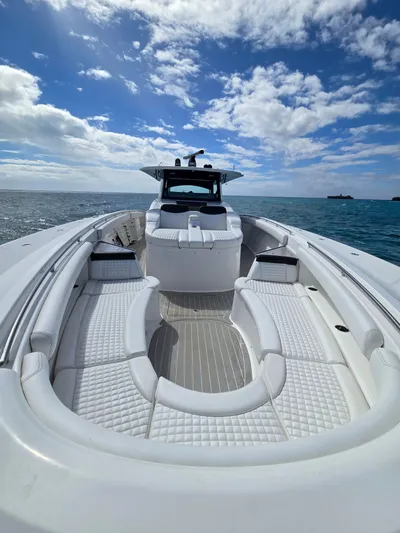 Lady Mash Yacht Photos Pics 2021 HCB 65 Estrella luxury boat on open sea under blue sky.