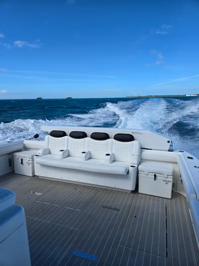 Lady Mash Yacht Photos Pics 2021 HCB 65 Estrella luxury boat cruising on open water, featuring spacious seating.