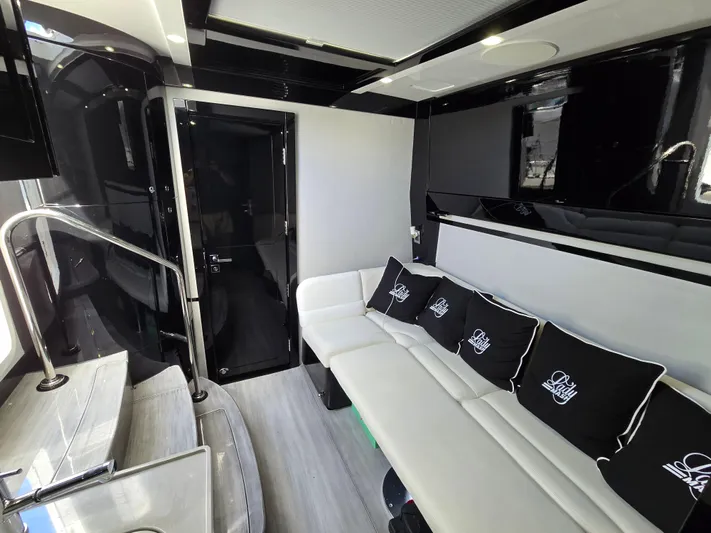 Lady Mash Yacht Photos Pics Luxurious interior of 2021 HCB 65 Estrella yacht with sleek design and comfortable seating.