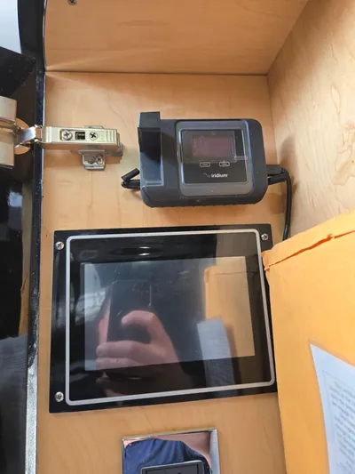 Lady Mash Yacht Photos Pics Interior of 2021 HCB 65 Estrella with electronic device and reflective screen.