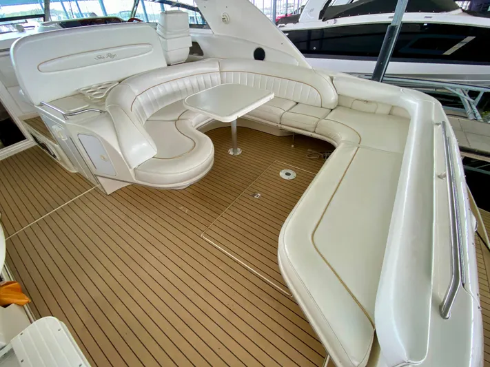  Yacht Photos Pics Luxurious 1996 Sea Ray 450 Sundancer yacht with spacious seating and elegant interior design.