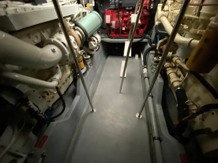  Yacht Photos Pics Engine room of a 1996 Sea Ray 450 Sundancer with visible machinery and components.