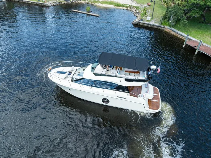 Have Another Yacht Photos Pics 2016 Beneteau Monte Carlo 4 yacht cruising on a calm river.