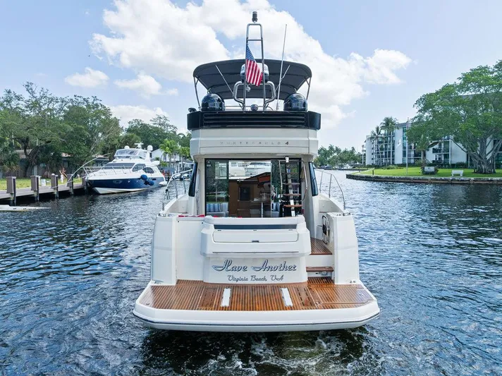 Have Another Yacht Photos Pics 2016 Beneteau Monte Carlo 4 yacht on a scenic waterway, rear view.