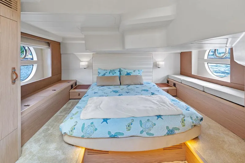 Have Another Yacht Photos Pics Luxurious bedroom interior of 2016 Beneteau Monte Carlo 4 yacht with ocean-themed bedding.