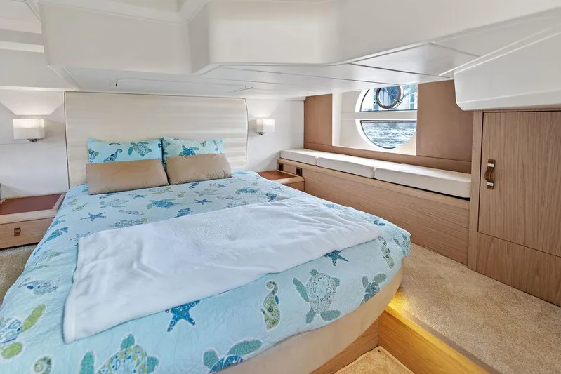 Have Another Yacht Photos Pics Luxurious bedroom interior of 2016 Beneteau Monte Carlo 4 yacht with ocean-themed bedding.