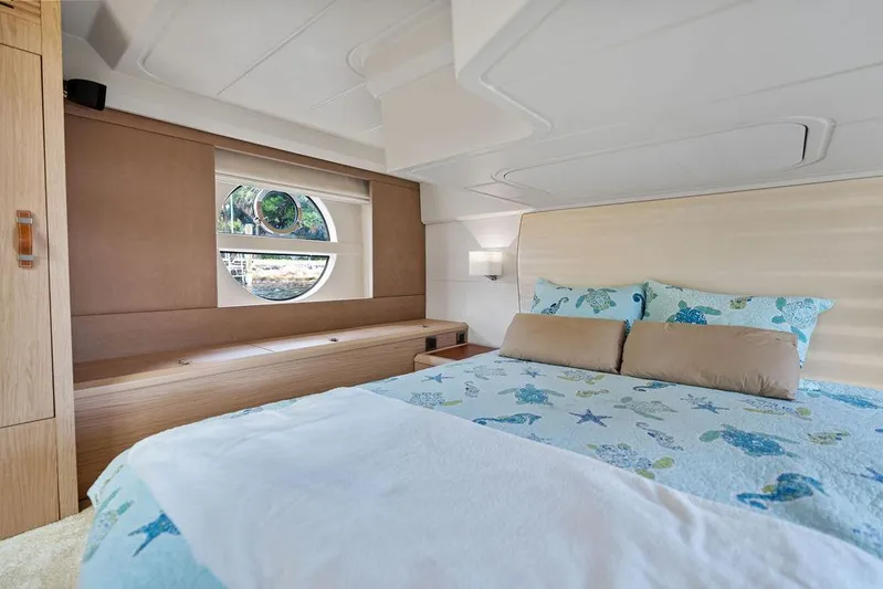 Have Another Yacht Photos Pics Luxurious cabin interior of 2016 Beneteau Monte Carlo 4 yacht with nautical-themed bedding.
