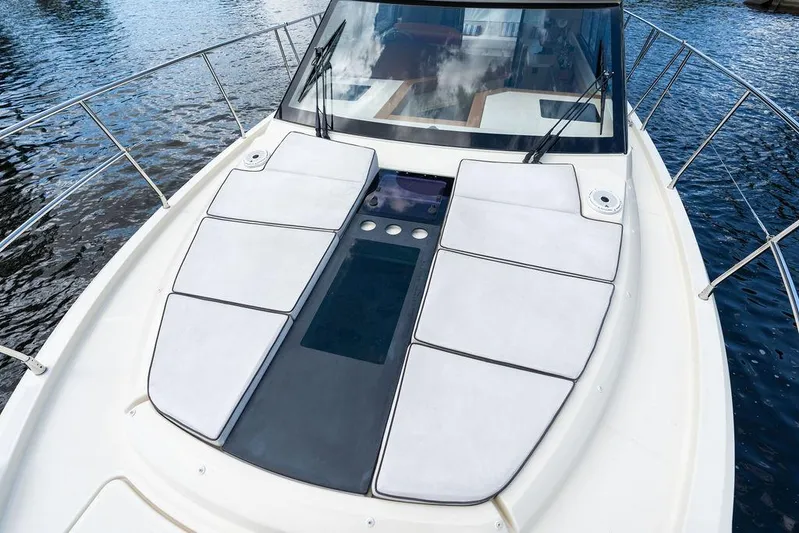 Have Another Yacht Photos Pics 2016 Beneteau Monte Carlo 4 yacht with sleek deck design on water.