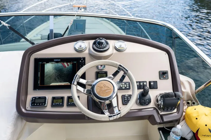 Have Another Yacht Photos Pics Helm of 2016 Beneteau Monte Carlo 4 yacht with navigation controls and steering wheel.