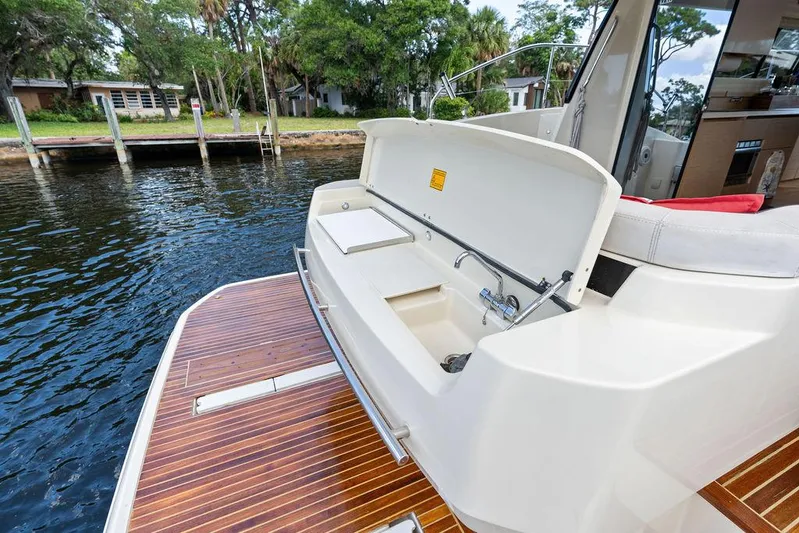 Have Another Yacht Photos Pics 2016 Beneteau Monte Carlo 4 yacht with open deck storage and water view.