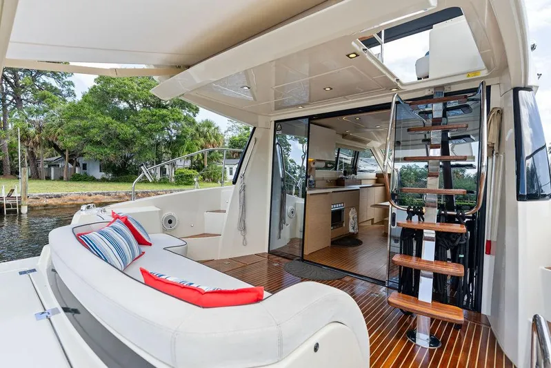 Have Another Yacht Photos Pics Luxurious 2016 Beneteau Monte Carlo 4 yacht interior with elegant seating and wooden flooring.
