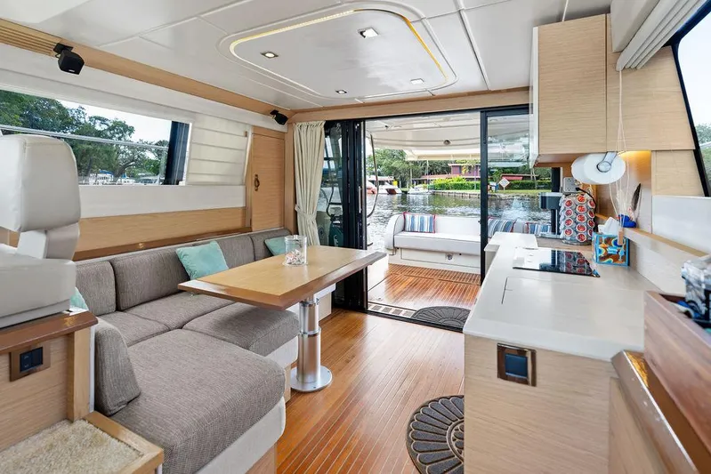 Have Another Yacht Photos Pics Luxurious interior of 2016 Beneteau Monte Carlo 4 yacht with modern furnishings and open layout.