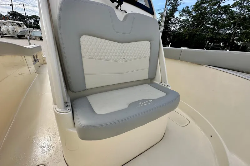  Yacht Photos Pics 2024 Scout 277 LXF boat seat with quilted design and gray accents.