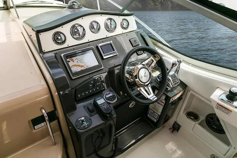  Yacht Photos Pics Manufacturer Provided Image: 2017 Sea Ray Sundancer 330 helm with navigation and control systems.