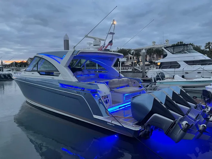  Yacht Photos Pics 2019 Formula 400 SSC yacht with blue LED lights docked at marina.