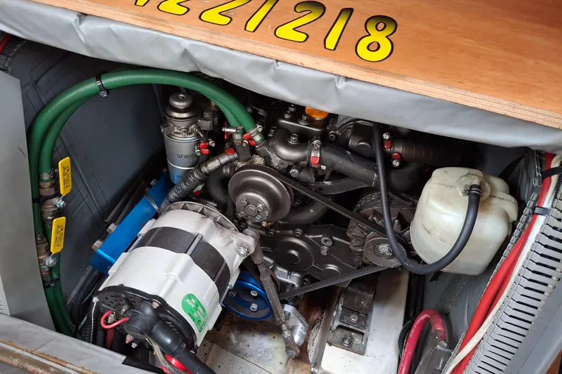 Majestic Yacht Photos Pics Engine compartment of 2009 Jeanneau Sun Odyssey 54 DS sailboat, showing mechanical components.