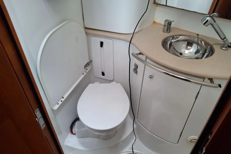 Majestic Yacht Photos Pics 2009 Jeanneau Sun Odyssey 54 DS yacht bathroom with toilet and sink.