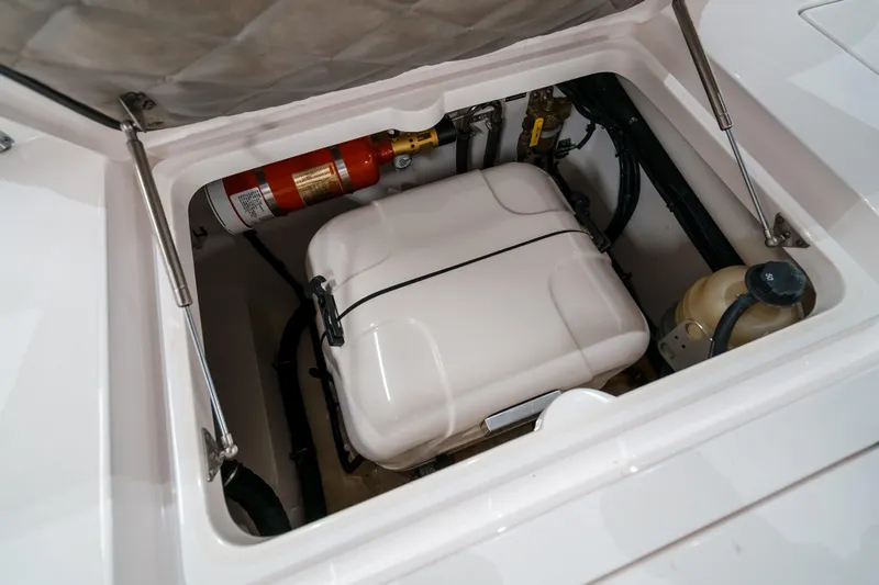 Tighten Up Yacht Photos Pics 2020 Intrepid 407 Panacea engine compartment with fire extinguisher and equipment.