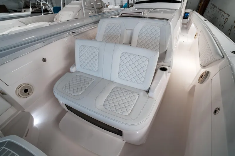 Tighten Up Yacht Photos Pics 2020 Intrepid 407 Panacea boat interior with white quilted seating.