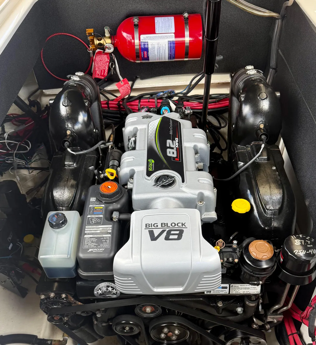 Engine compartment of a 2020 Sea Ray SLX 280 with a Big Block V8 engine.