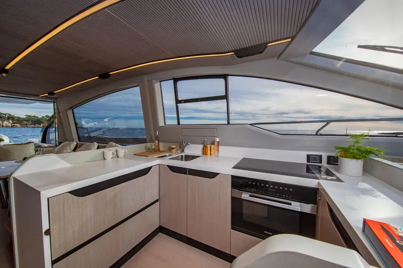  Yacht Photos Pics Luxurious 2023 Azimut S7 yacht kitchen with modern design and ocean view.