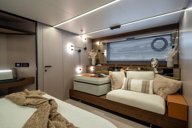  Yacht Photos Pics Luxurious interior of 2023 Azimut S7 yacht with modern decor and cozy seating area.