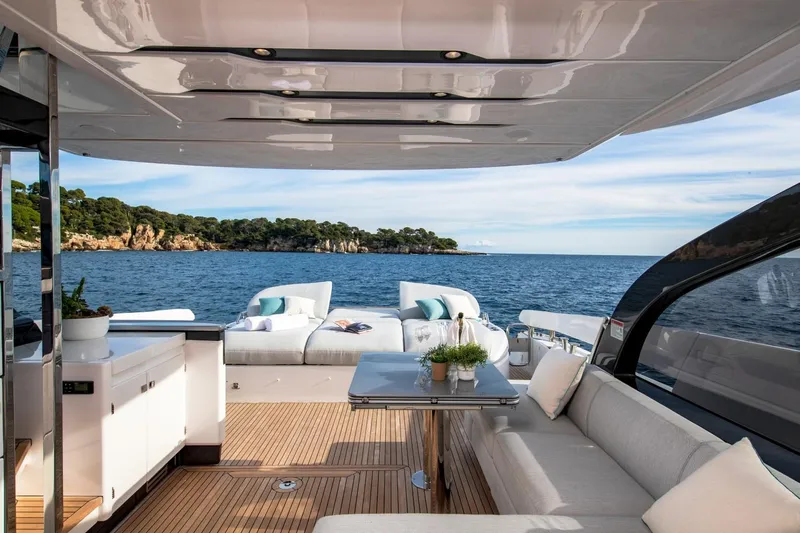  Yacht Photos Pics Luxurious 2023 Azimut S7 yacht interior with ocean view and elegant seating area.
