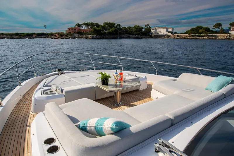  Yacht Photos Pics Luxurious 2023 Azimut S7 yacht deck with elegant seating and ocean view.