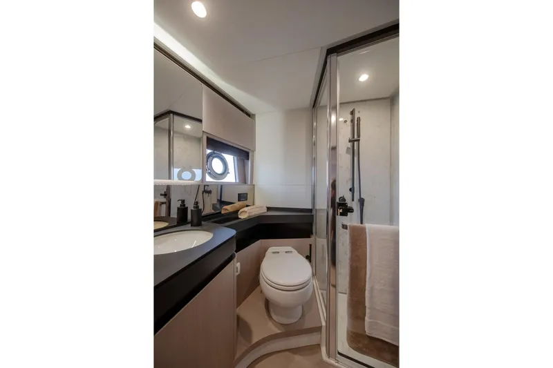  Yacht Photos Pics Luxurious bathroom in 2023 Azimut S7 yacht with modern fixtures and elegant design.