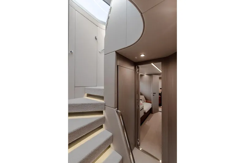  Yacht Photos Pics Interior of 2023 Azimut S7 yacht, featuring modern staircase and sleek cabin entrance.