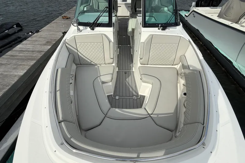  Yacht Photos Pics 2023 Pursuit DC 326 Dual Console boat with spacious seating and elegant design.
