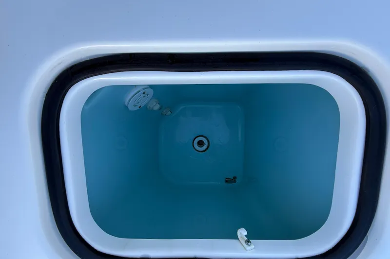  Yacht Photos Pics Livewell compartment of 2023 Pursuit DC 326 Dual Console boat.