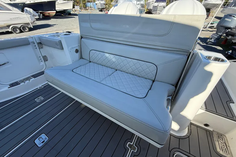  Yacht Photos Pics 2023 Pursuit DC 326 Dual Console boat with luxurious seating and modern design.