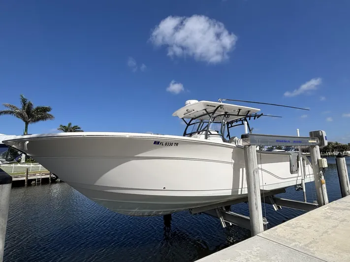  Yacht Photos Pics 2023 Sea Fox 328 Commander boat docked under clear blue sky.