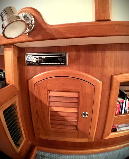 Azure Yacht Photos Pics Interior of 2005 Pacific Seacraft 40 yacht with wooden cabinetry and stereo system.