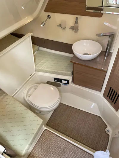  Yacht Photos Pics 2019 Chris-Craft Catalina 30 bathroom with modern fixtures and compact design.