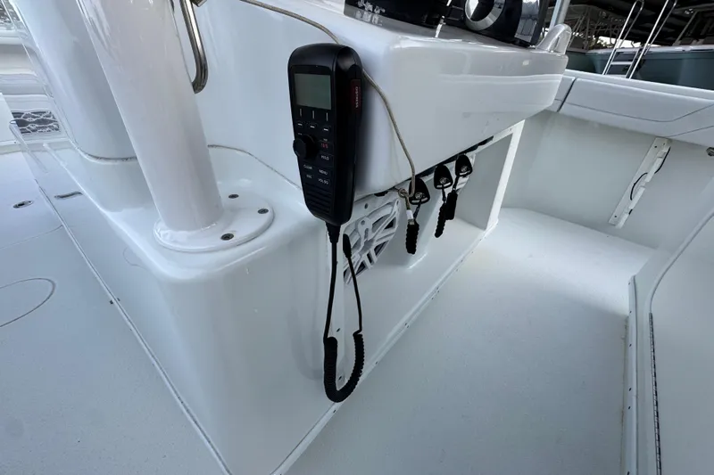 Yacht Photos Pics 2019 Yellowfin 34 Offshore boat interior with radio and control panel.