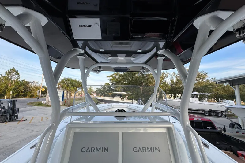  Yacht Photos Pics 2019 Yellowfin 34 Offshore boat with Garmin electronics and Mercury equipment, docked outdoors.