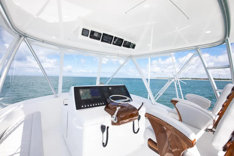 2026 46' Viking 46 Billfish Yacht Photos Pics Helm of 2026 Viking 46 Billfish yacht with ocean view and modern controls.