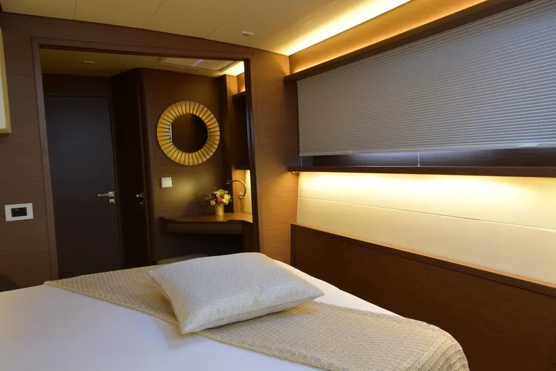  Yacht Photos Pics Luxurious interior cabin of 2018 Lagoon 52 F yacht with elegant decor and ambient lighting.