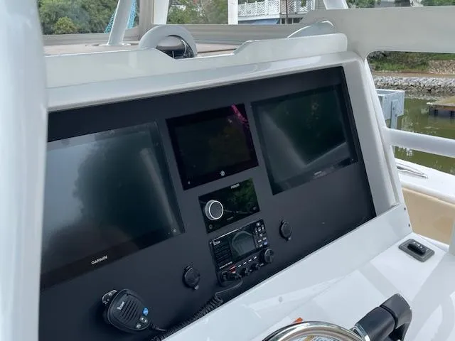  Yacht Photos Pics 2022 Invincible 36 Open Fisherman dashboard with advanced navigation displays and controls.