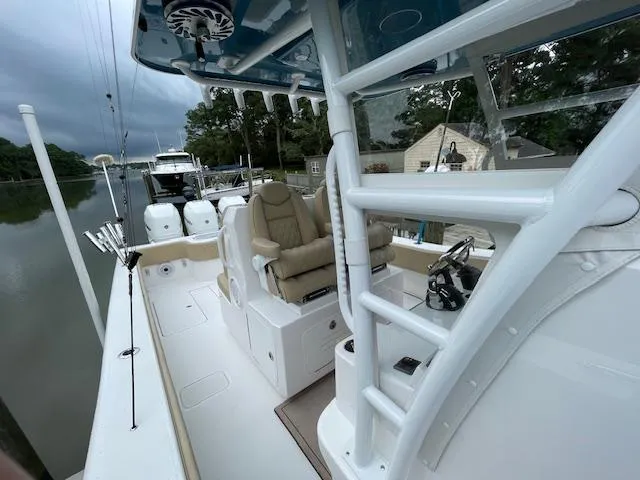  Yacht Photos Pics 2022 Invincible 36 Open Fisherman boat interior with seating and controls.