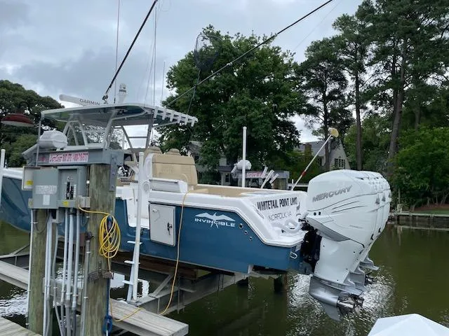  Yacht Photos Pics 2022 Invincible 36 Open Fisherman boat docked with Mercury engines.
