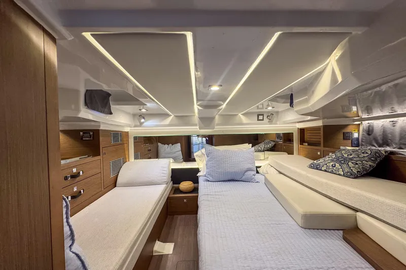Trade In Yacht Photos Pics Luxurious interior of 2022 Jeanneau Leader 12.5 WA yacht cabin with modern design.