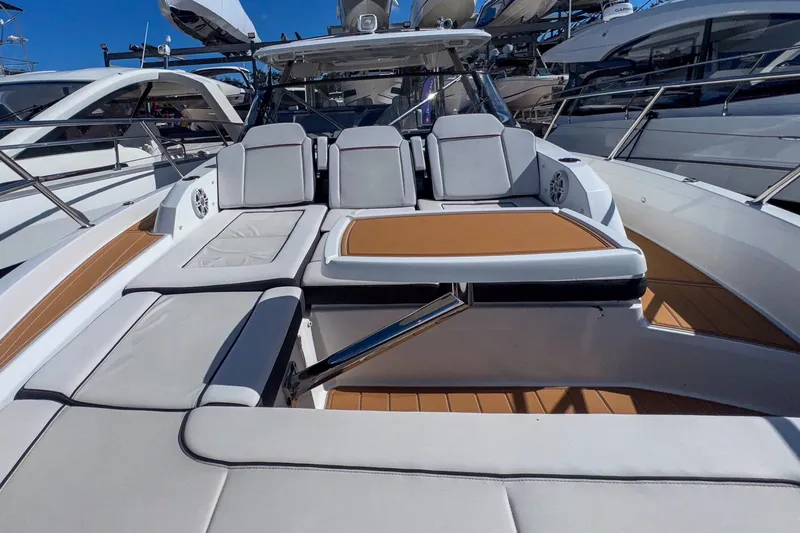 Trade In Yacht Photos Pics 2022 Jeanneau Leader 12.5 WA boat with luxurious seating and sleek design.