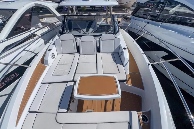 Trade In Yacht Photos Pics 2022 Jeanneau Leader 12.5 WA boat with spacious seating and sleek design.